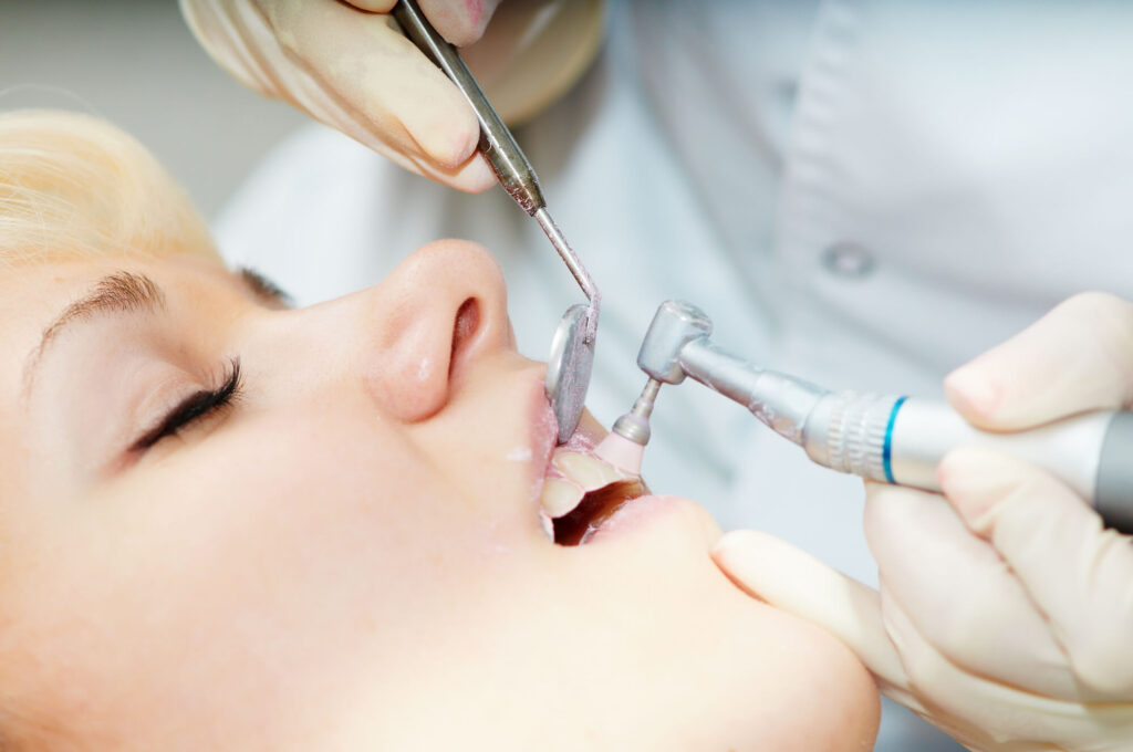 a woman getting professional dental care in Somerset